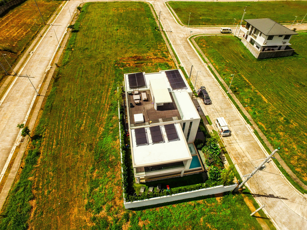 Top shot of a roof top with a handful of solar panels