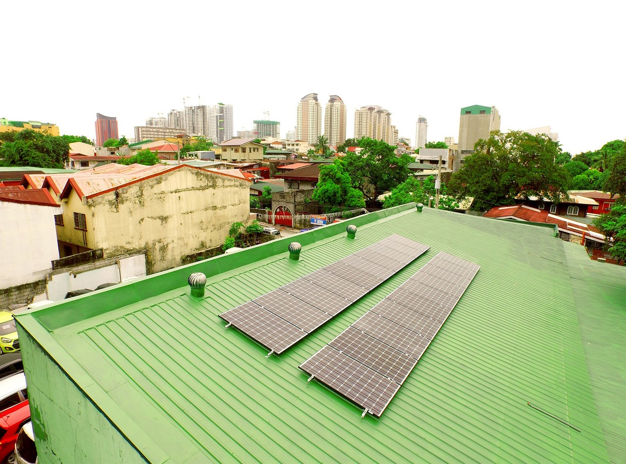 Close up of a house's rooftop with solar panels