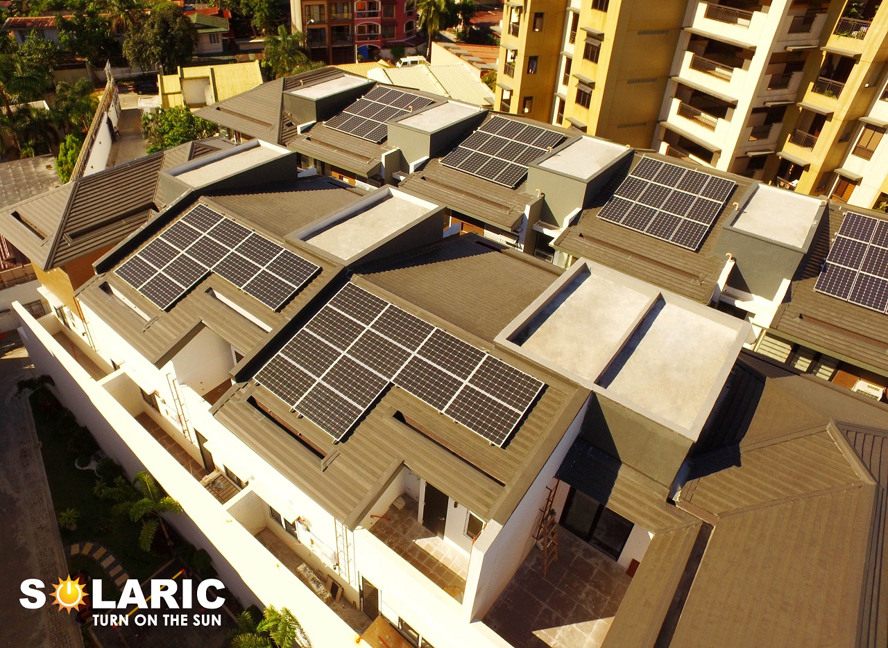 Top view of a house with solar on its rooftop