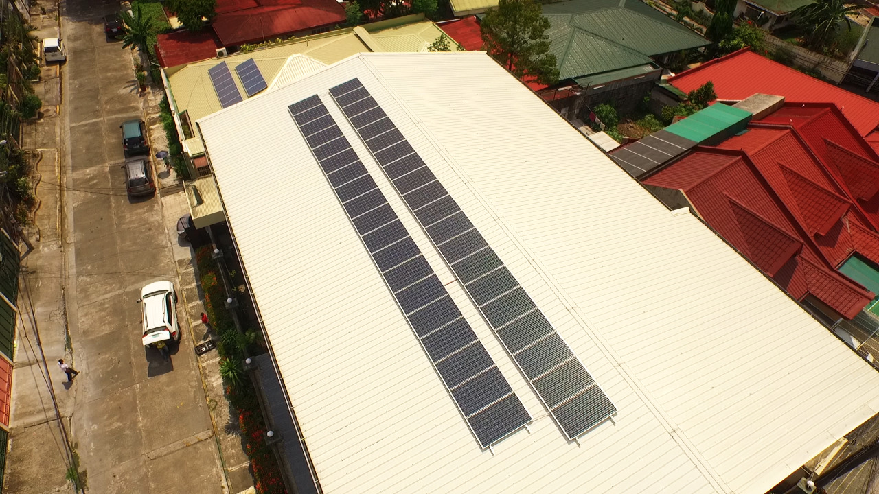 Top view of a structure with solar panels