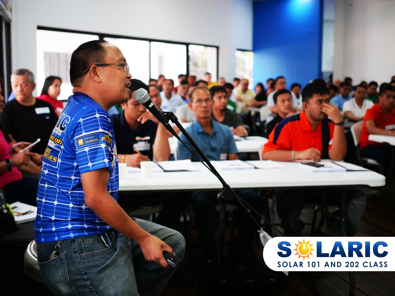 A solar speaker talking about his experiences