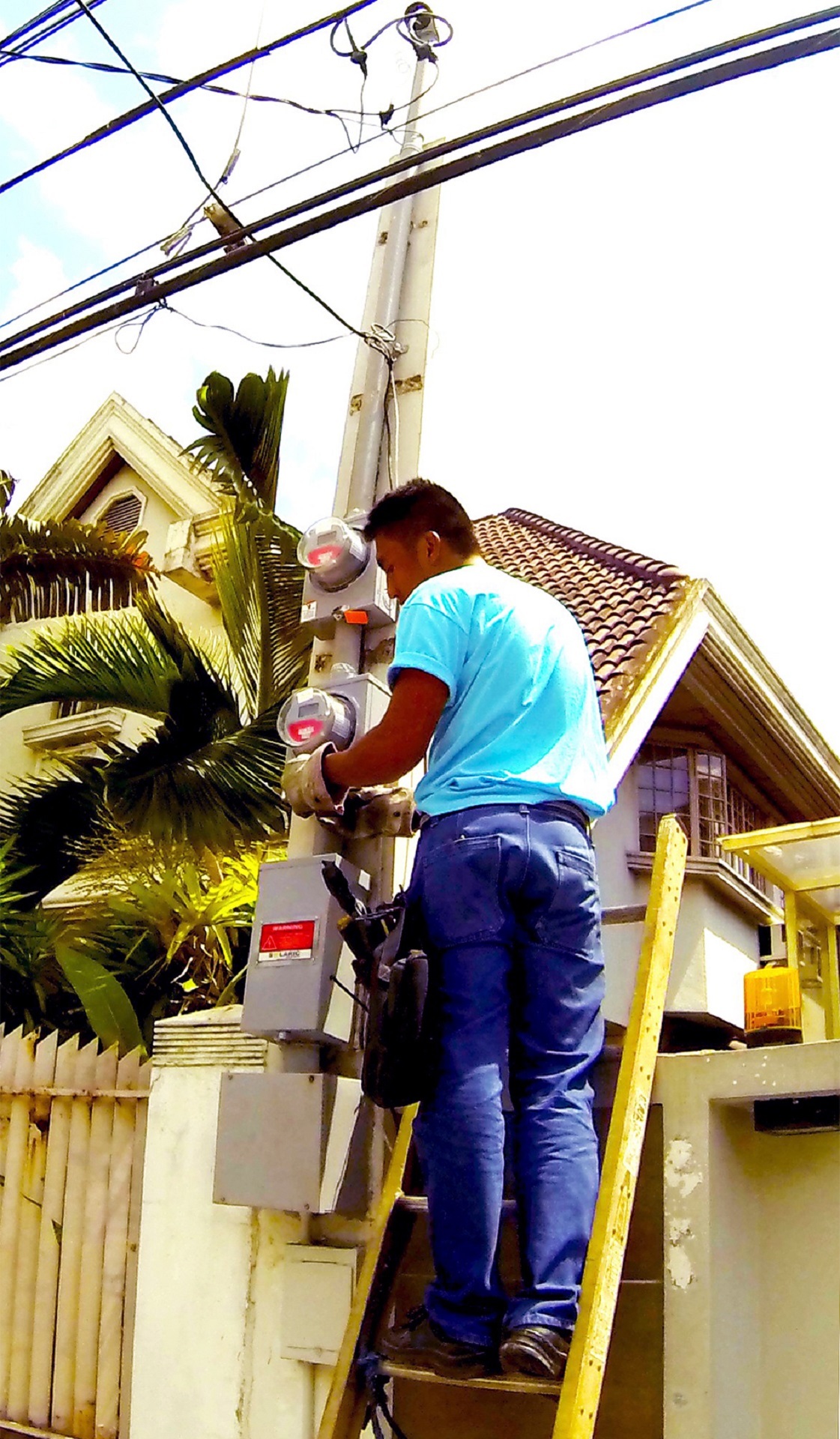 Man installing net metering